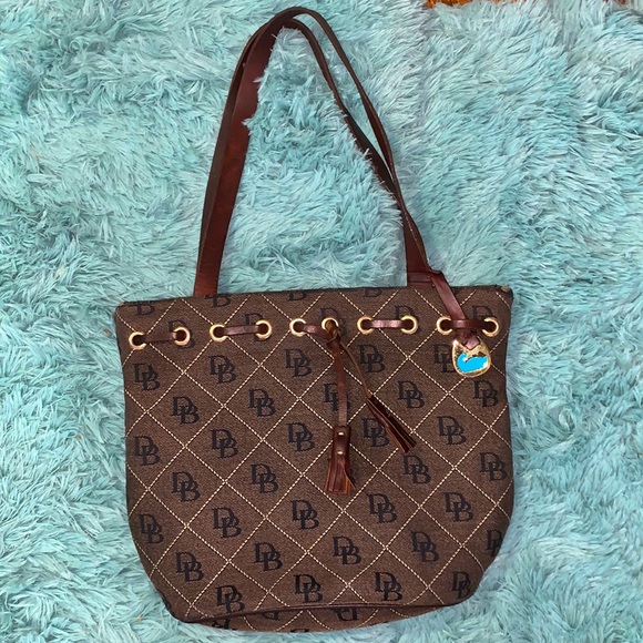Dooney & Bourke Handbags - Dooney & Bourke Monogram Tassel Dark Brown Canvas Bucket Bag